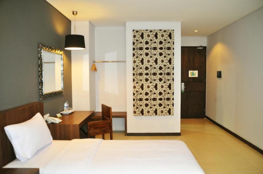 Praja Hotel Ντενπασάρ Δωμάτιο φωτογραφία